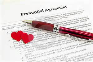 prenup and red pen and hearts